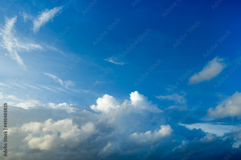 Blue sky background with tiny clouds. fluffy clouds in the sky. Background summer sky Blue sky background with tiny clouds. fluffy clouds in the sky. Background summer sky