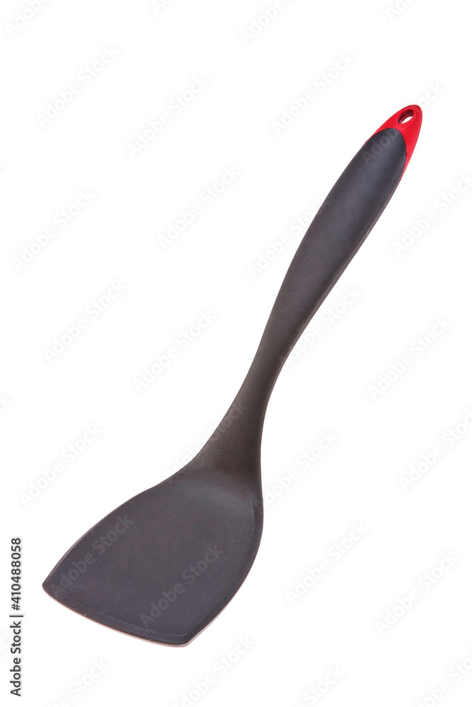 Dark gray with red plastic kitchen spatula, isolated on white background Dark gray with red plastic kitchen spatula, isolated on white background
