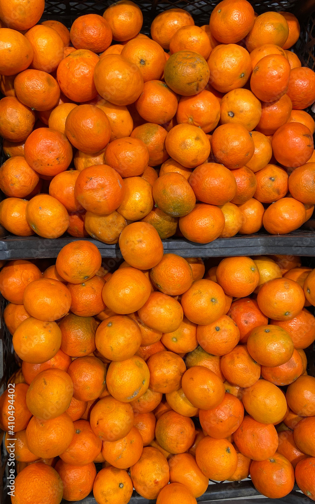 Boxes of tangerines on the market