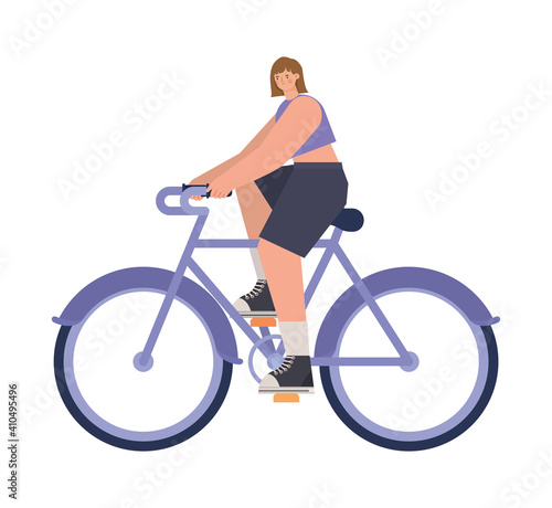 woman over a purple bycicle