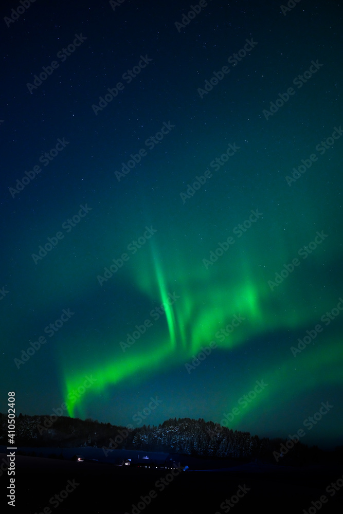 aurora borealis over the mountains in Norway. Northern lights
