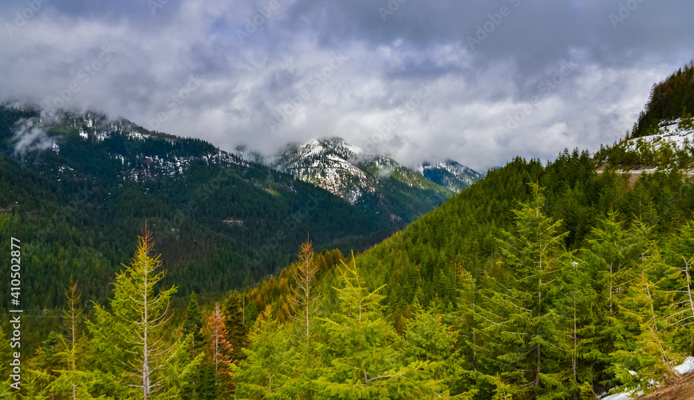 Mountain landscape. Snow in the mountains at the end of winter, snow melting in the mountains.