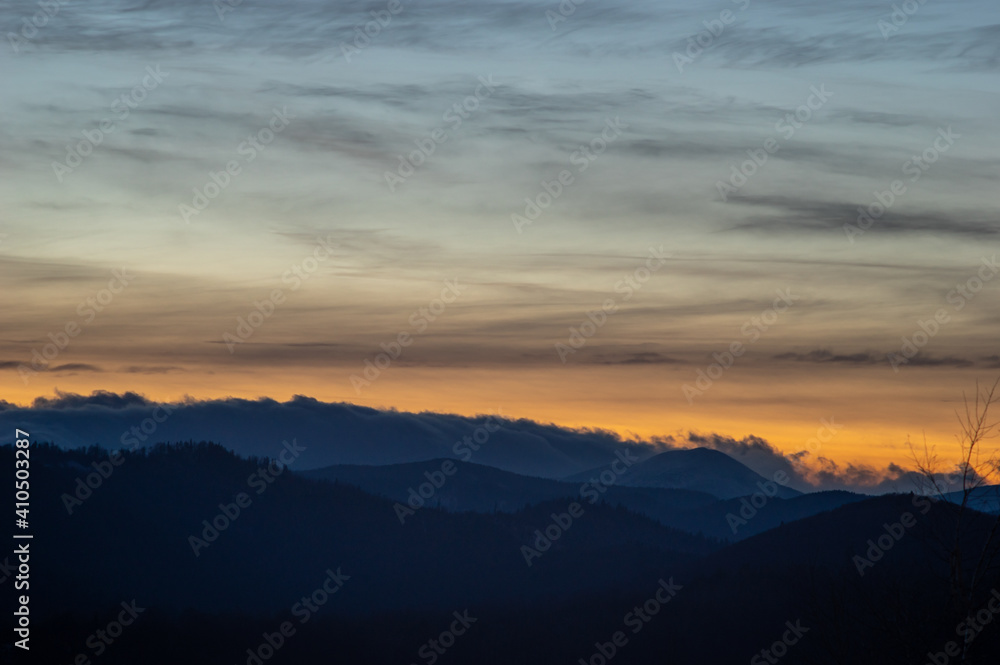 Colorful sky at sunset in the mountains