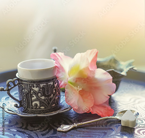 still life with tea and flowers