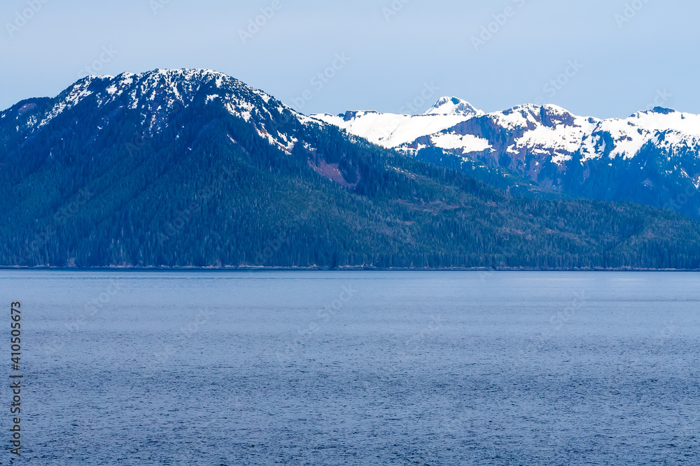 Snow-capped mountains along the coast of southern Alaska