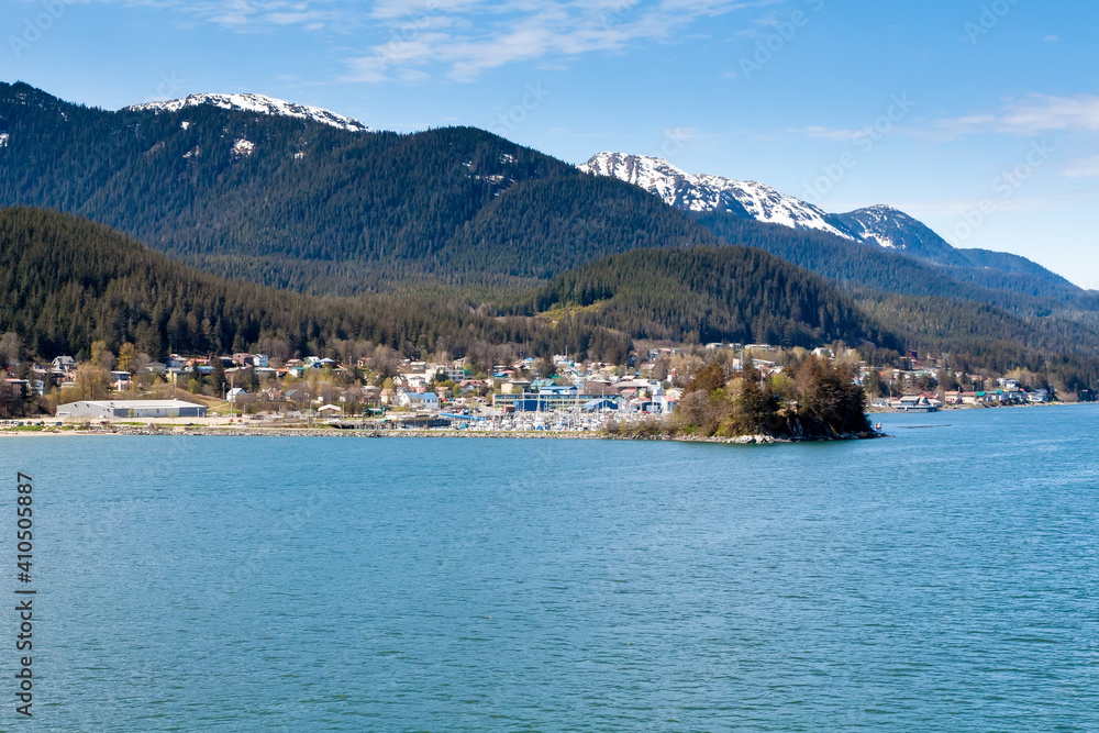 Fototapeta premium View of Juneau, the capital city of Alaska, with surrounding mountains and forests