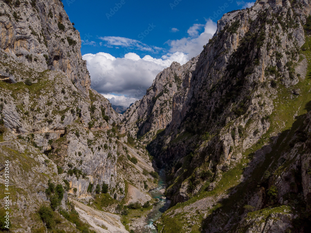 The Cares Route in the heart of Picos de Europa National Park, Cain-Poncebos, Asturias, Spain. Narrow and impressive canyon between cliffs, bridges, caves, footpaths and rocky mountains.