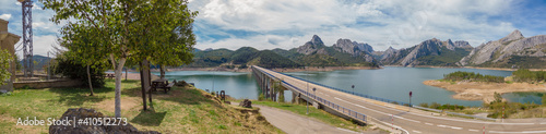 Panoramic view of the bridge over the Riano reservoir in Northern Spain. Yordas Peak towers over Riano, the Cantabrian Mountains, Castile-Leon region.