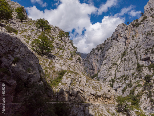 The Cares Route in the heart of Picos de Europa National Park, Cain-Poncebos, Asturias, Spain. Narrow and impressive canyon between cliffs, bridges, caves, footpaths and rocky mountains. © An Instant of Time