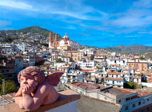 Mexico, Taxco city lookout overlooking scenic hills and colorful colonial historic city center. photo