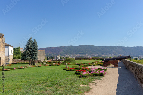 Chaves, Portugal, September 6, 2020: View of old wooden-based cannon in the garden of Chaves castle in Portugal.