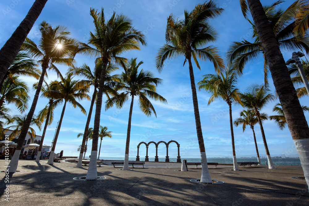 Obraz premium Famous Puerto Vallarta sea promenade, El Malecon, with ocean lookouts, beaches, scenic landscapes hotels and city views.