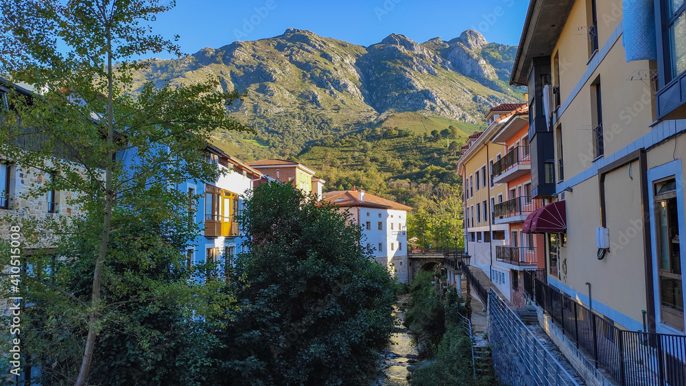 Cabrales, Spain - September 3, 2020: Bridge over the Arroyo Ribeles in Las Arenas. Cabrales is a municipality in the autonomous community of Asturias, northwestern Spain.