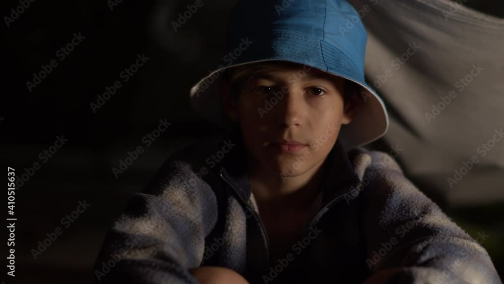 portrait of a sad boy hat looking at the camera in dark room, abandoned house portrait of a sad boy hat looking at the camera in dark room, abandoned house