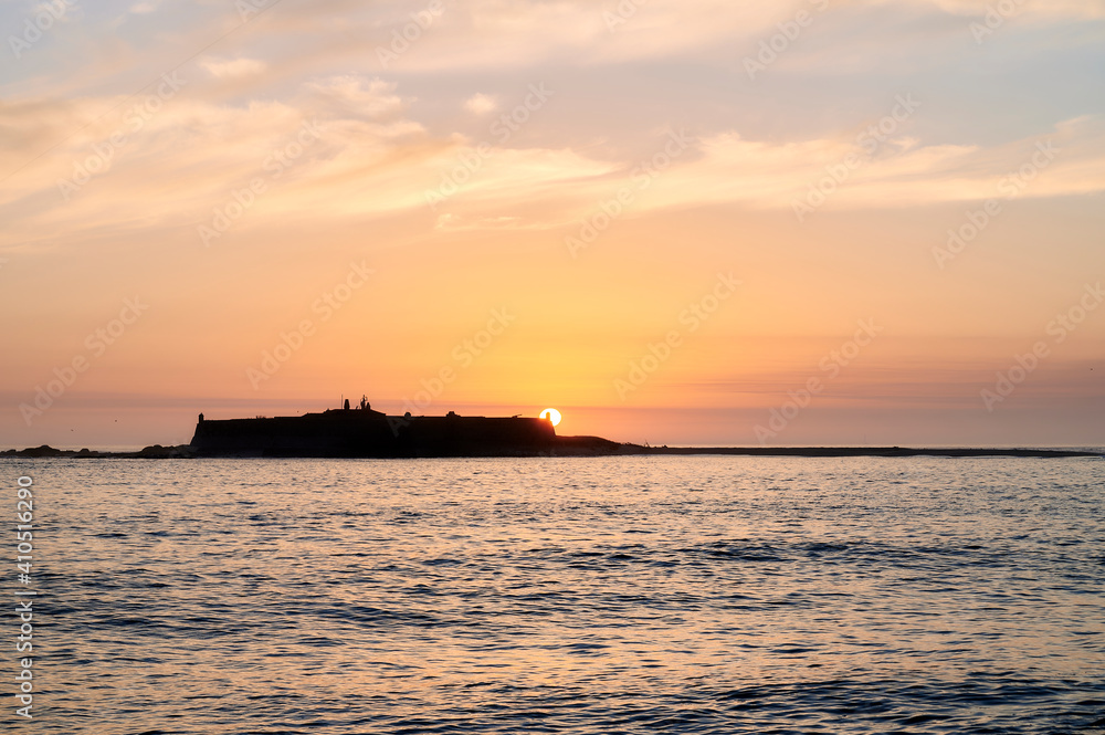 Moledo beach sunset with ins fort and Trega mount