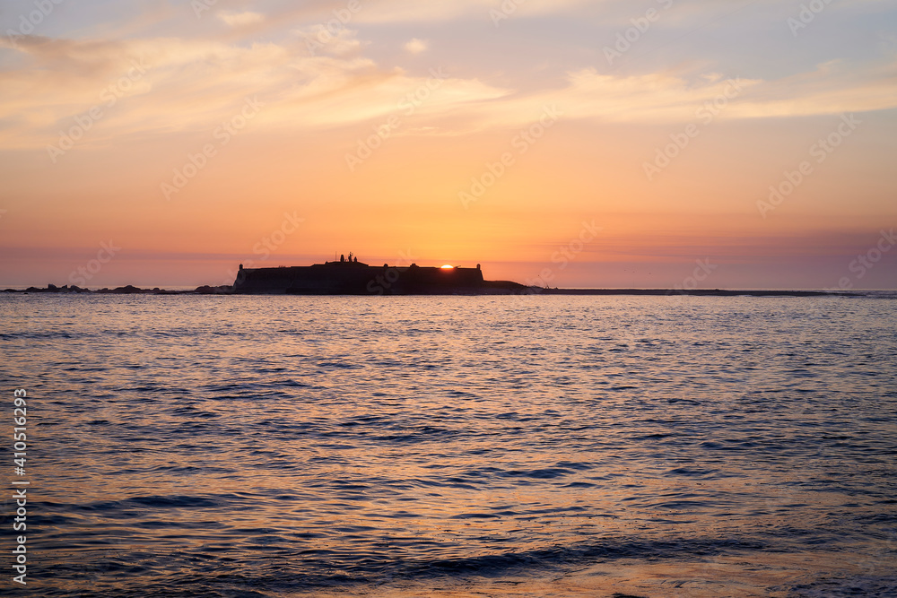 Moledo beach sunset with ins fort and Trega mount Moledo beach sunset with ins fort and Trega mount