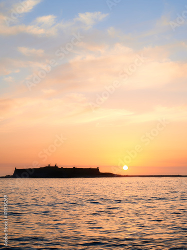 Moledo beach sunset with ins fort and Trega mount © Aldrin