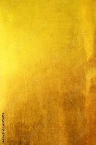 Gold background or texture and gradients shadow. gold polished metal steel texture abstract background.