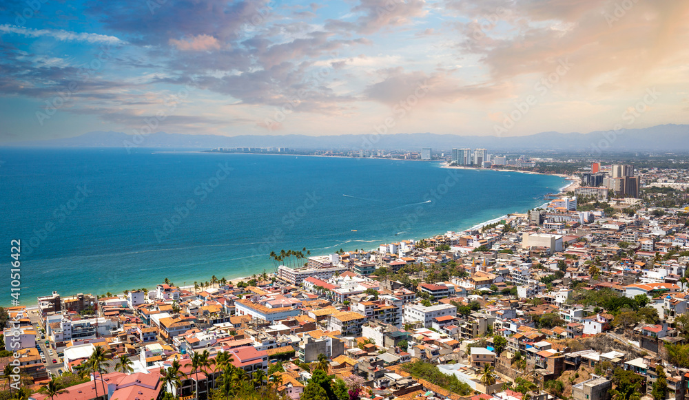 Scenic Mirador Cerro La Cruz Lookout with panoramic views of Puerto Vallarta and famous shoreline with ocean beaches and luxury hotels.