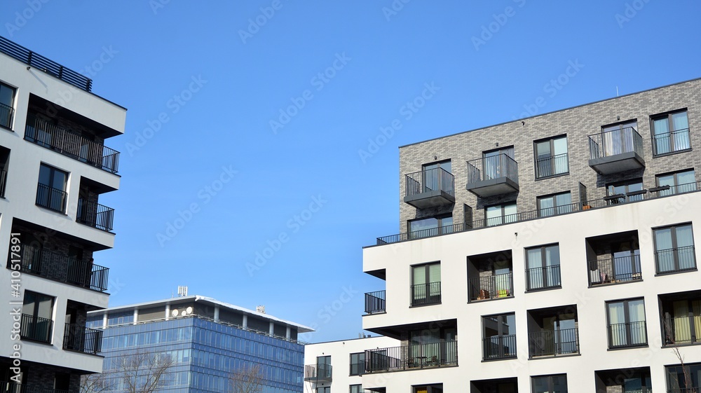 Modern apartment building in sunny day. Exterior, residential house facade.