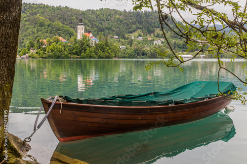 Fototapeta Naklejka Na Ścianę i Meble -  Wooden boat at Bled lake, Slovenia