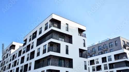Modern apartment building in sunny day. Exterior, residential house facade. © Grand Warszawski