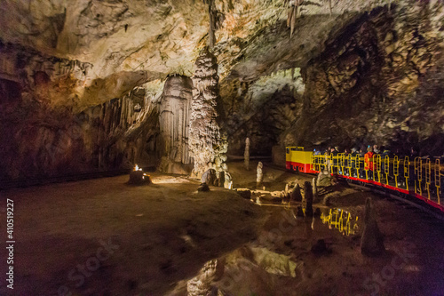 Quadro em tela Underground tourist train in Postojna cave, Slovenia