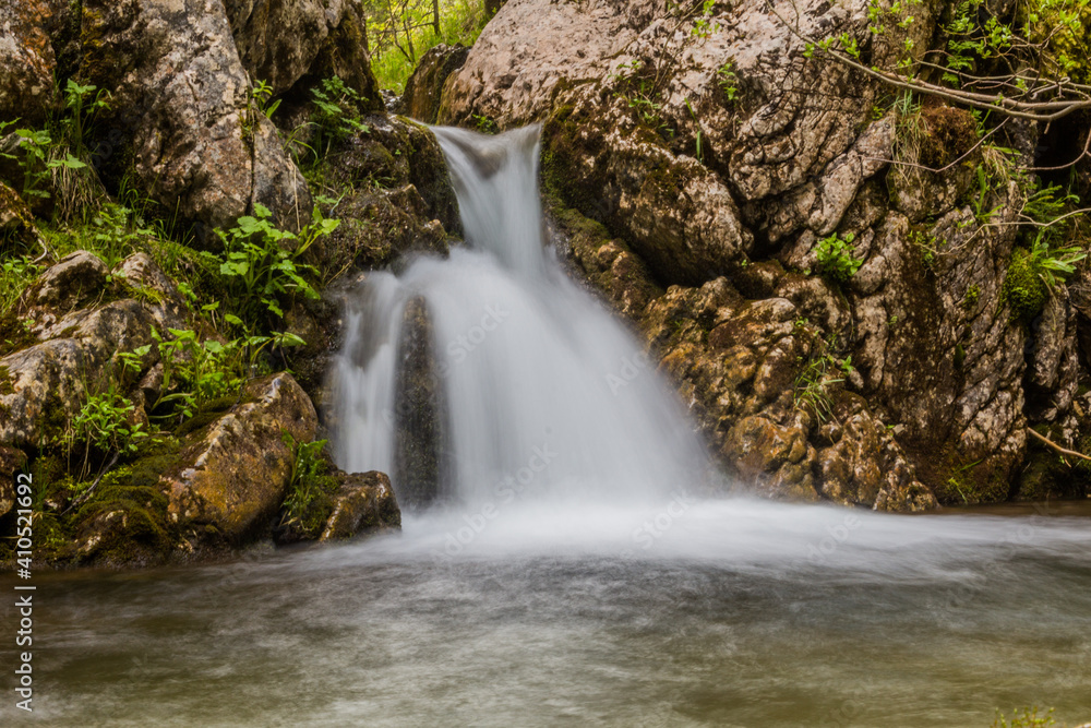 Small waterfall at Mlinski potok stream in Durmitor mountains, Montenegro