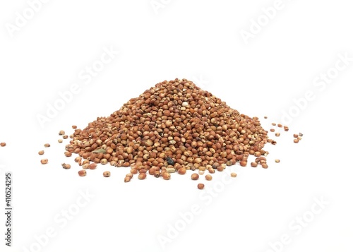 buckwheat on white background Sorghum millet grain pile on white background