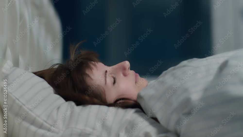 happy woman puts her head on a pillow, woman enjoying going to bed happy woman puts her head on a pillow, woman enjoying going to bed