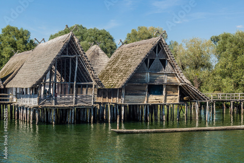 Stilt houses (Pfahlbauten), Stone and Bronze age dwellings in Unteruhldingen town, Baden-Wurttemberg state, Germany © Matyas Rehak