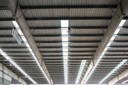 The roof is made of matal sheet  and has a strong structure with translucent panels to provide light