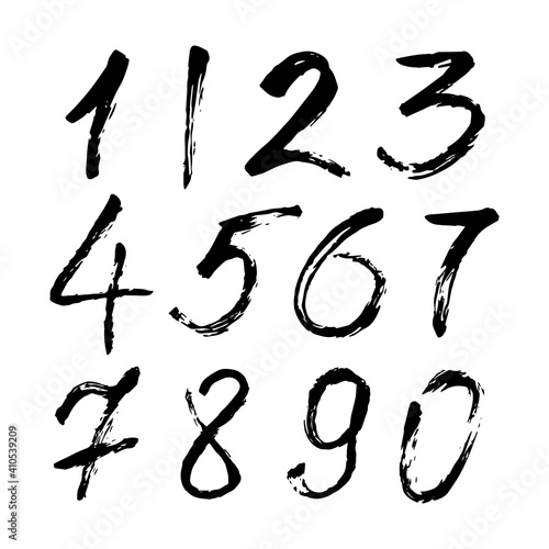 Set of calligraphic numbers painted by black brush on isolated white background. Lettering for your design.