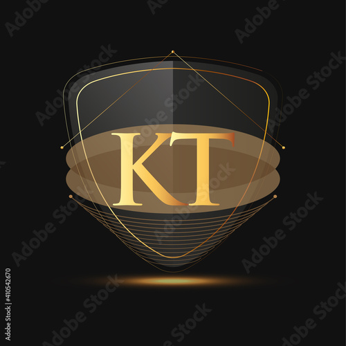 Initial logo letter KT with shield Icon golden color isolated on dark background, logotype design for company identity.