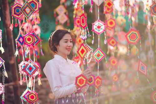 Asian girl in traditional Thai dress It is a tribal dress in Thailand. The uniqueness of the dress of Phutai Style at the Prathat Yakoo. The Dvaravati Period The main attractions of Kalasin. photo