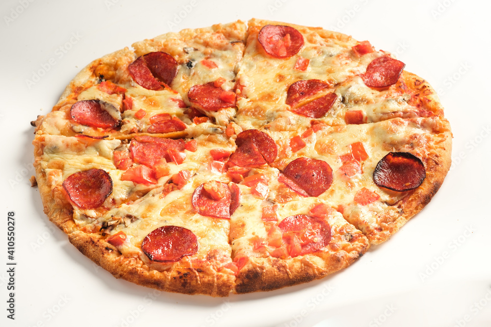 Pepperoni pizza isolated on white background. Italian food concept. Appetizing pizza.