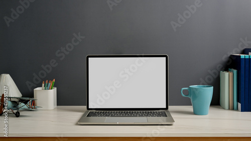 Wallpaper Mural Worktable with laptop, stationery and decorations in home office room Torontodigital.ca