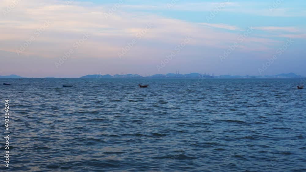 Hua hin Thailand ocean at dusk wave and small boats local pier Hua hin Thailand ocean at dusk wave and small boats local pier