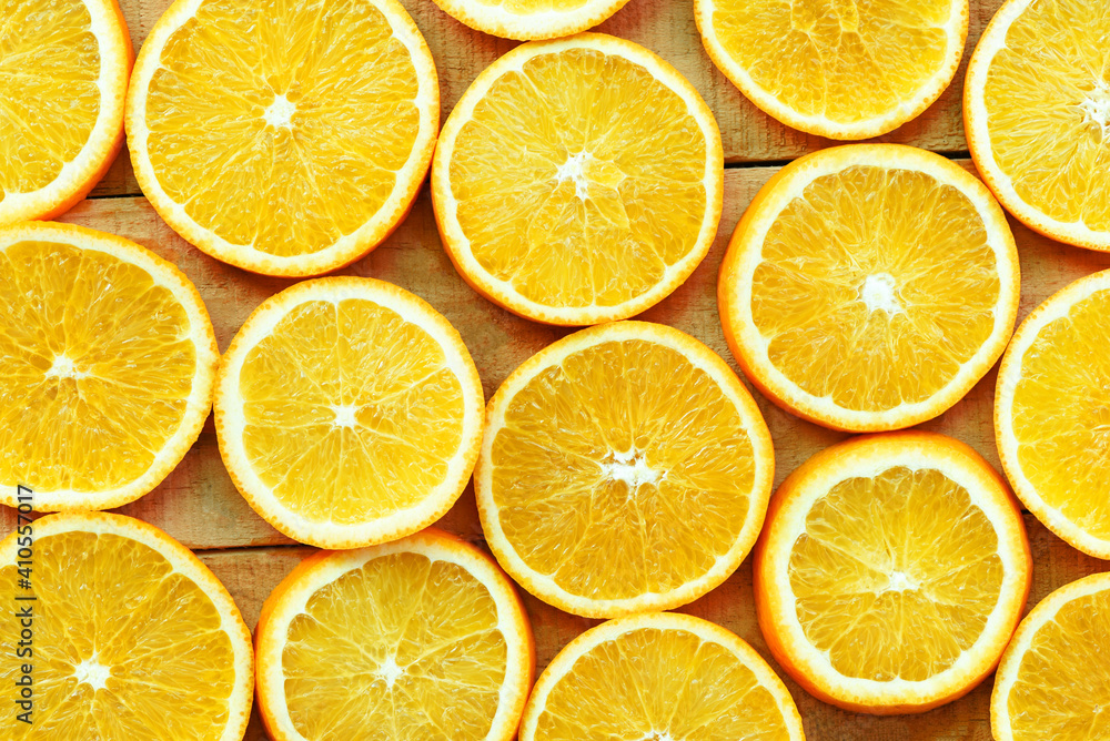Orange slices texture background, Fresh orange fruits orange pattern on wooden background