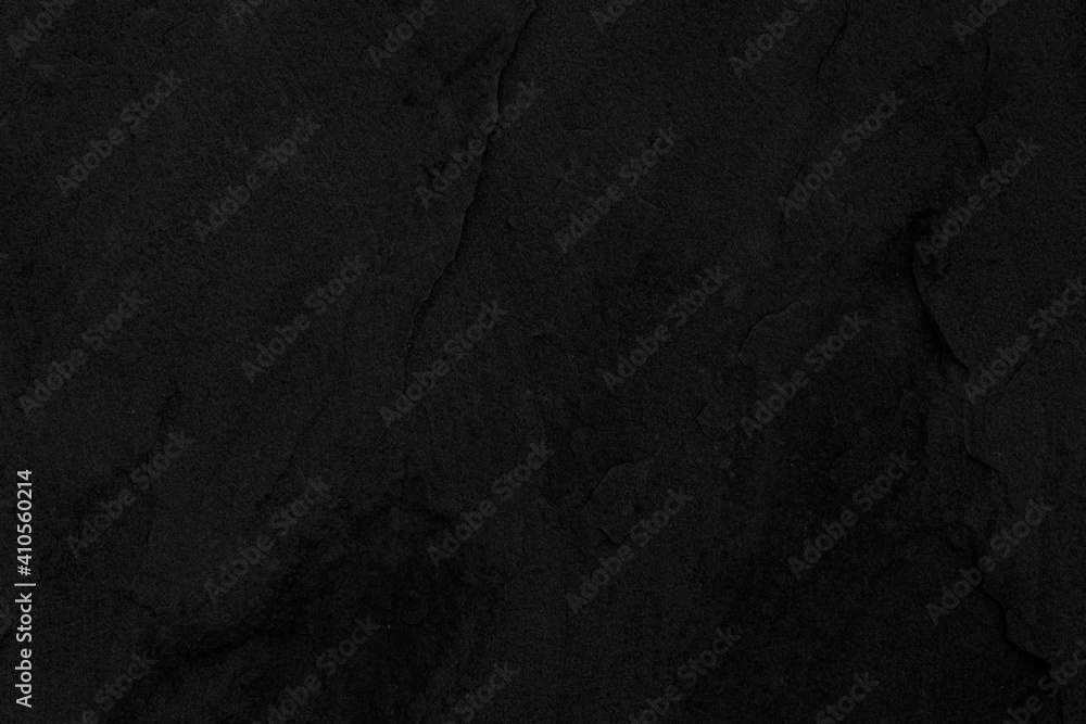 Dark grey black slate background or texture. Black granite slabs background Dark grey black slate background or texture. Black granite slabs background