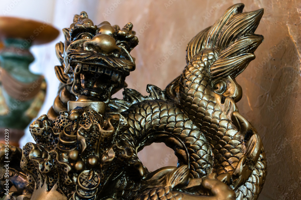 January 2021: Close-up of a gold dragon sculpture, in time for lunar or Chinese new year. 
