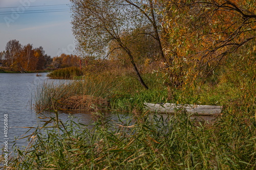 Boat on the autumn river