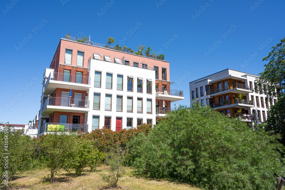 Modern apartment houses in a green surrounding in Berlin, Germany