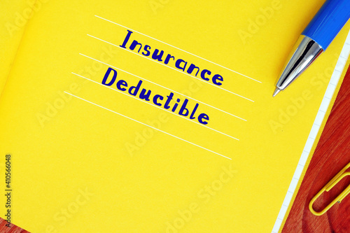 Business concept meaning Insurance Deductible with phrase on the page.