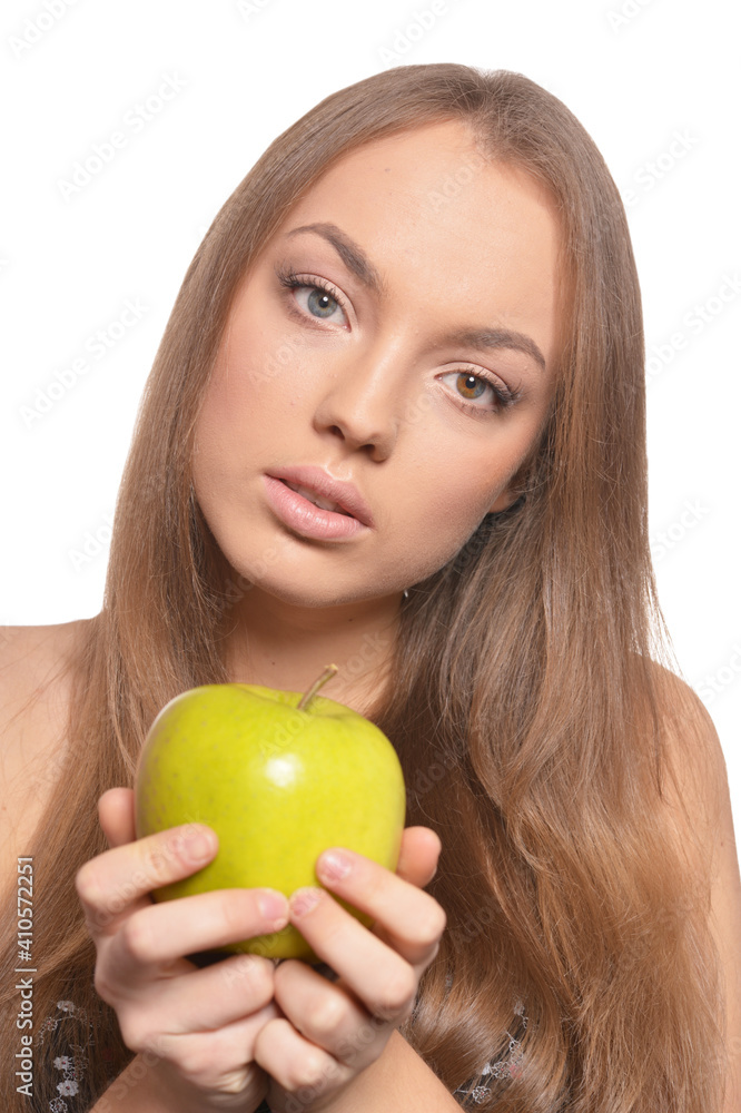 Portrait of beautiful young woman with green apple Portrait of beautiful young woman with green apple