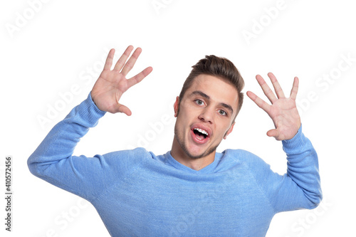 Portrait of young man posing isolated