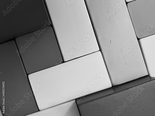 puzzle wood blocks in black white color tones.