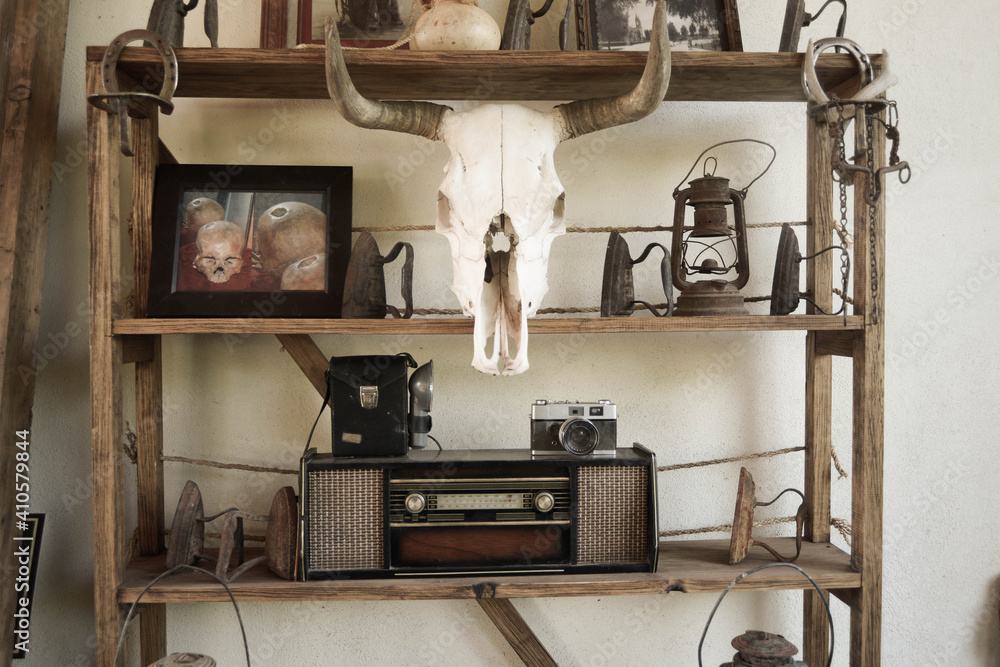 Antique objects, radio, beef skull and mining objects

