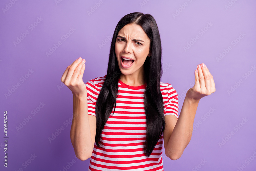 Photo of troubled mad lady raise hands open mouth have fight wear striped red shirt isolated purple color background Photo of troubled mad lady raise hands open mouth have fight wear striped red shirt isolated purple color background