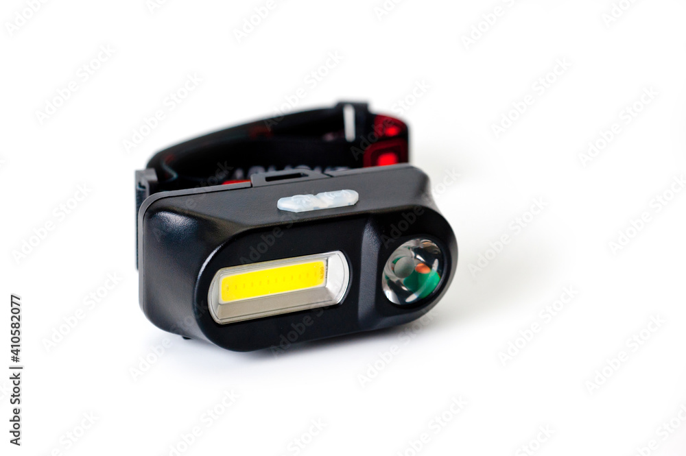 LED headlamp with two light sources for tourism, sports and work. LED headlamp with two light sources for tourism, sports and work.